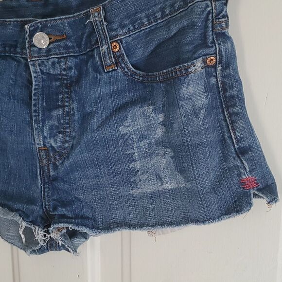 Levi's Cutoff Distressed Jean Shorts - Picture 2 of 12